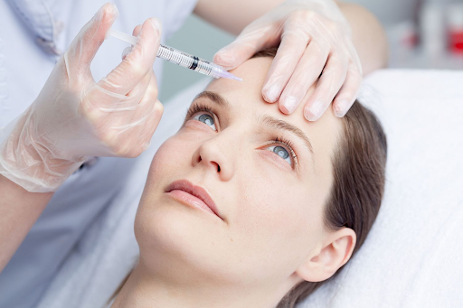 Forehead 's wrinkles removal by botox injections